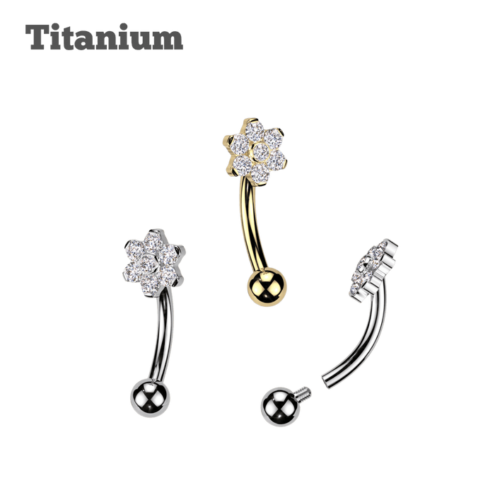 A set of three titanium curved barbells with daisy flower designs, featuring gold and silver color options, intended for rook piercings.