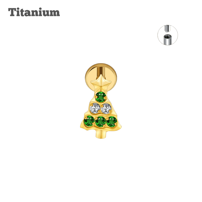 Gold Christmas tree-shaped earring with green gemstones on a black background